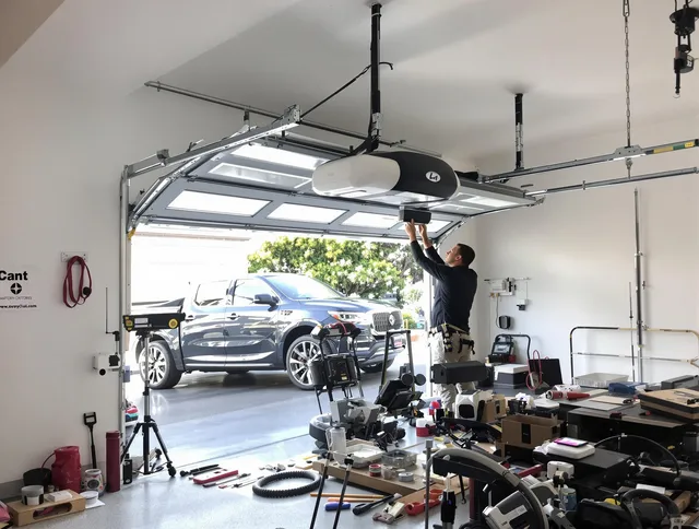 Brunswick Garage Door Repair specialist installing smart garage door opener system in Brunswick home