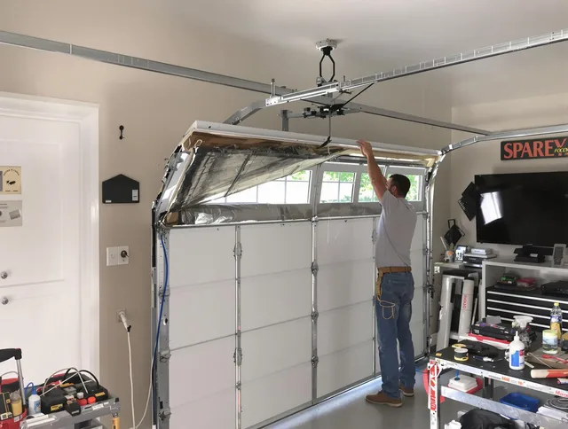 Garage door section replacement by Brunswick Garage Door Repair in Brunswick