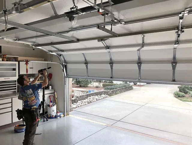 Garage door track repair service by Brunswick Garage Door Repair in Brunswick